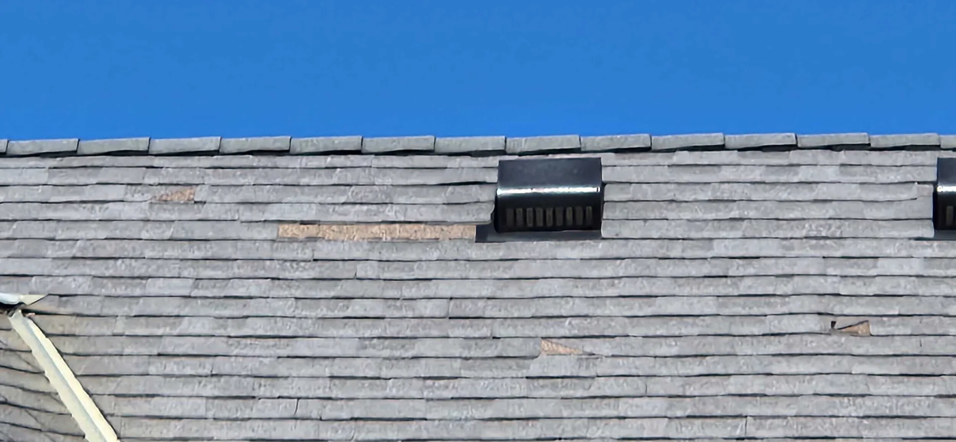 Hail damaged asphalt shingle roof inspected by a roofing contractor in Farmington MN